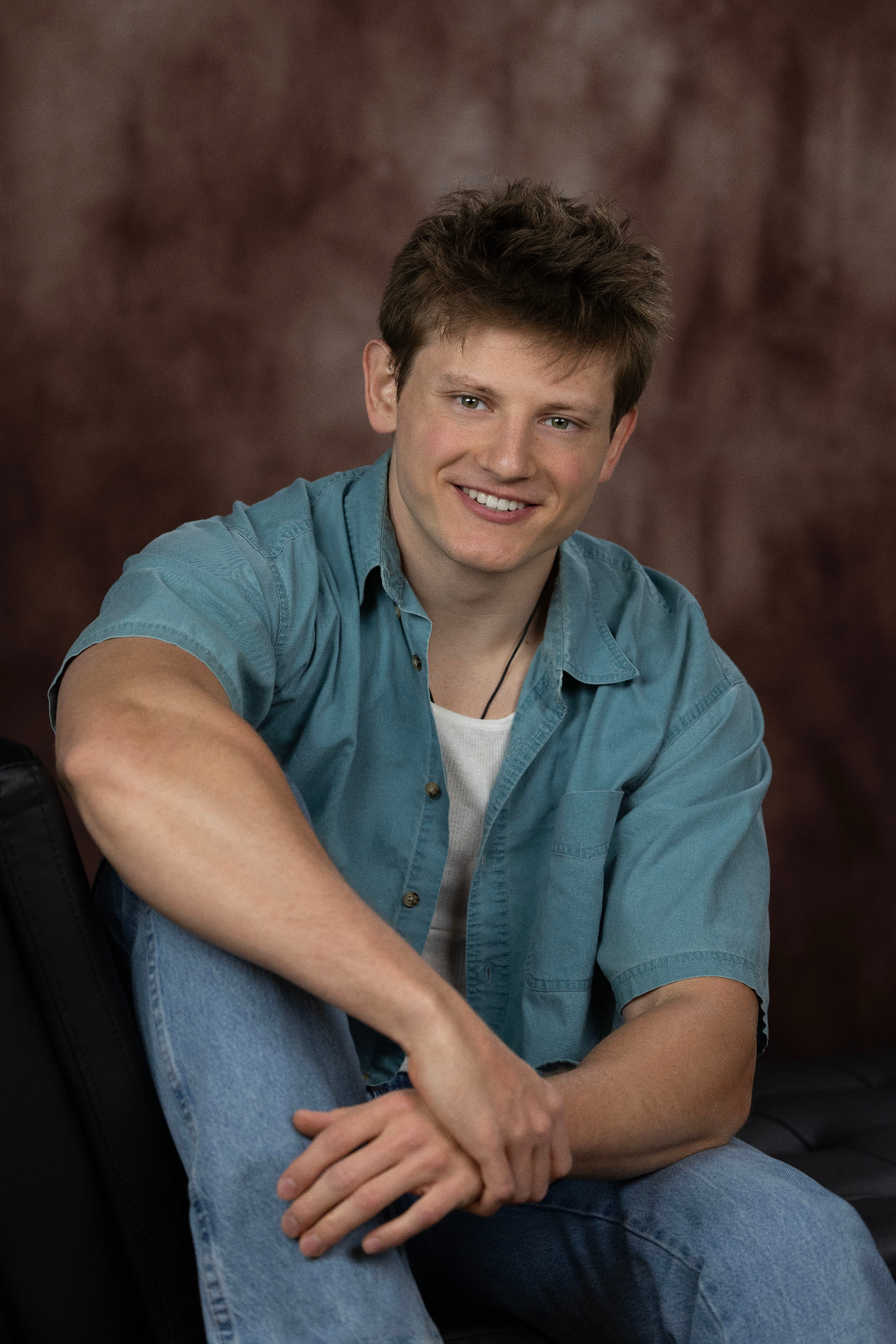 Headshot — Blue Shirt